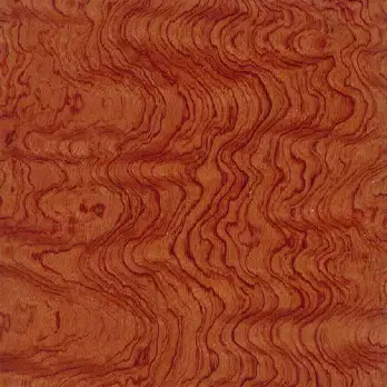 Close-up of figured Bubinga wood with reddish tone